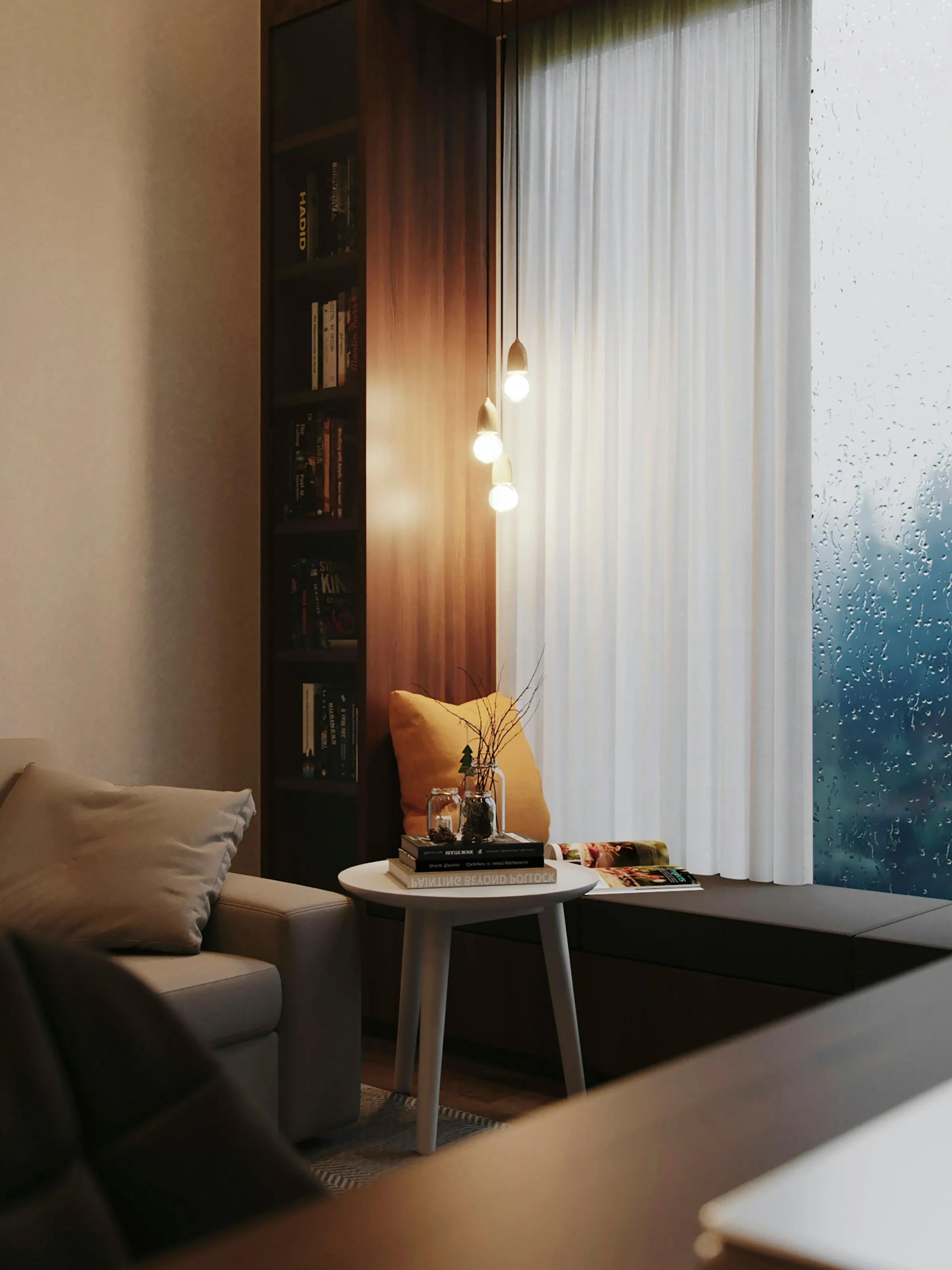 Leeshoek met fauteuil, bijzettafel en boekenkast bij het raam